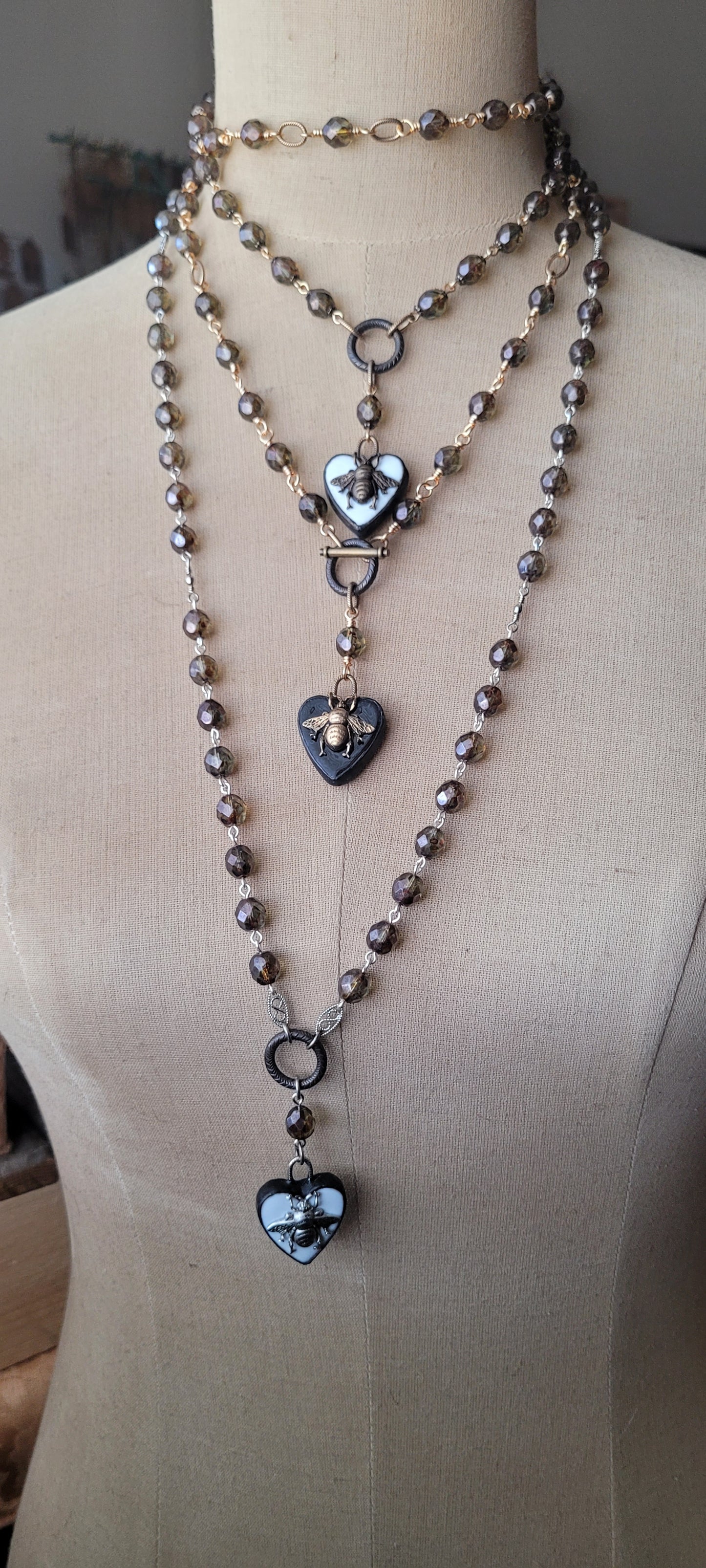 Black Ceramic Queen Bee Heart necklace,  green pine Picasso Czech crystal beads, rosary style bead chain necklace