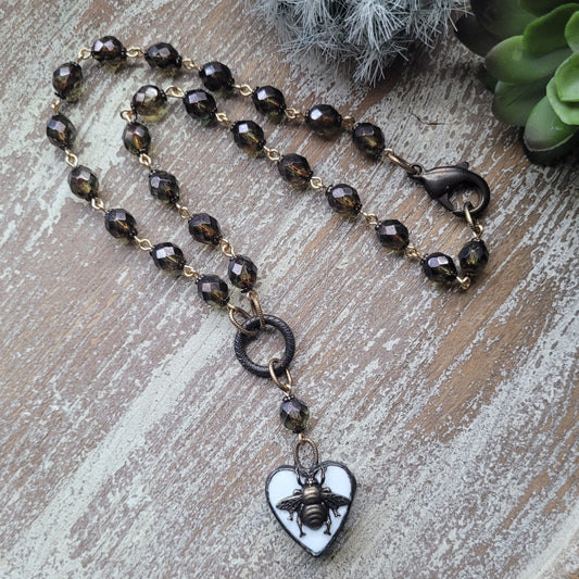 White Ceramic Bronze Queen Bee Heart necklace, green pine Picasso Czech crystal beads, rosary style beaded chain