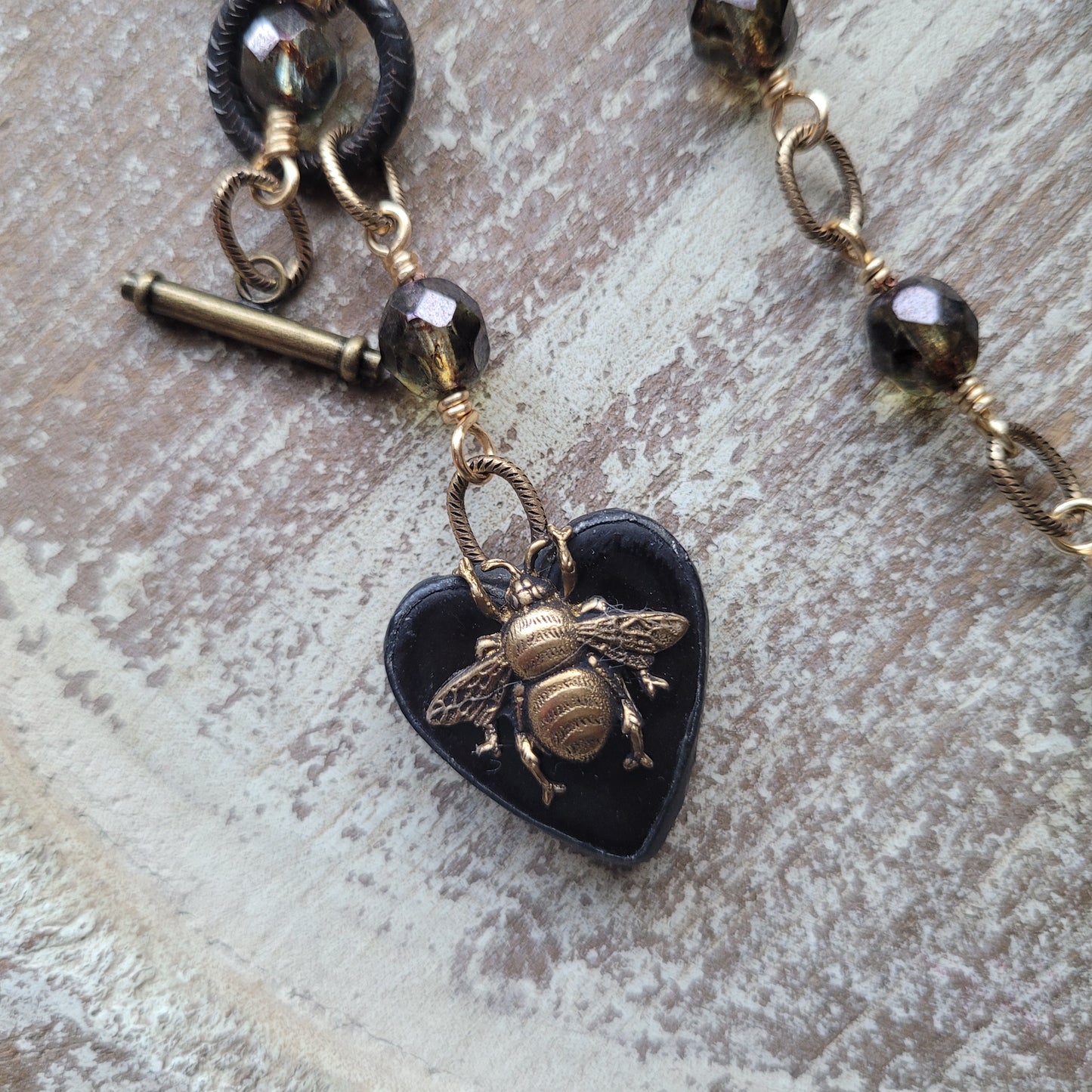 Black Ceramic Queen Bee Heart necklace,  green pine Picasso Czech crystal beads, rosary style bead chain necklace
