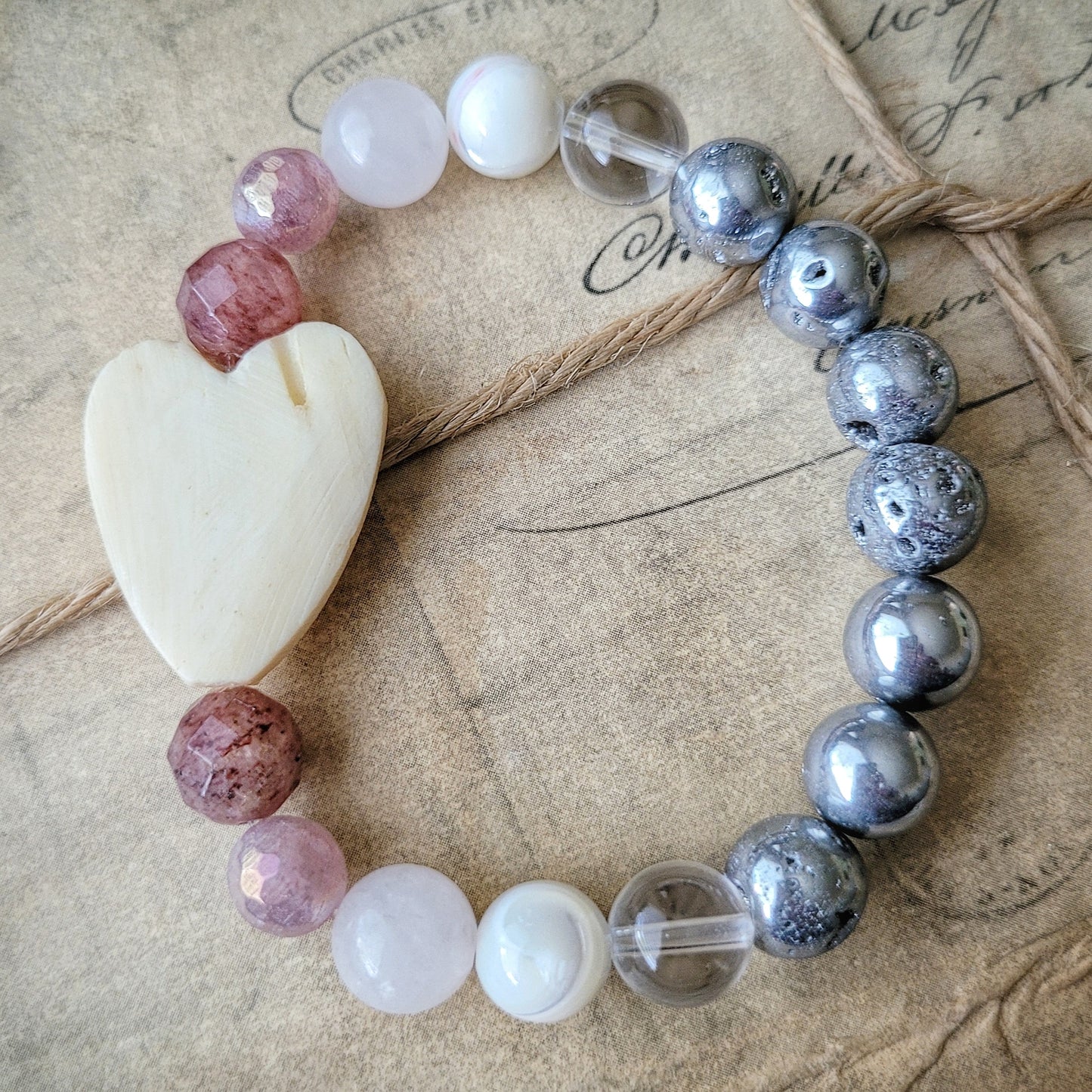 Scarred Heart,  elasticized/stretch boho bracelet, bone heart focal bead Russian Muscovite, Strawberry Quartz, Rise Quartz, Mother-of-pearl,Peruvian Quartz, Titanium Druzy boho bracelet, heart bracelet