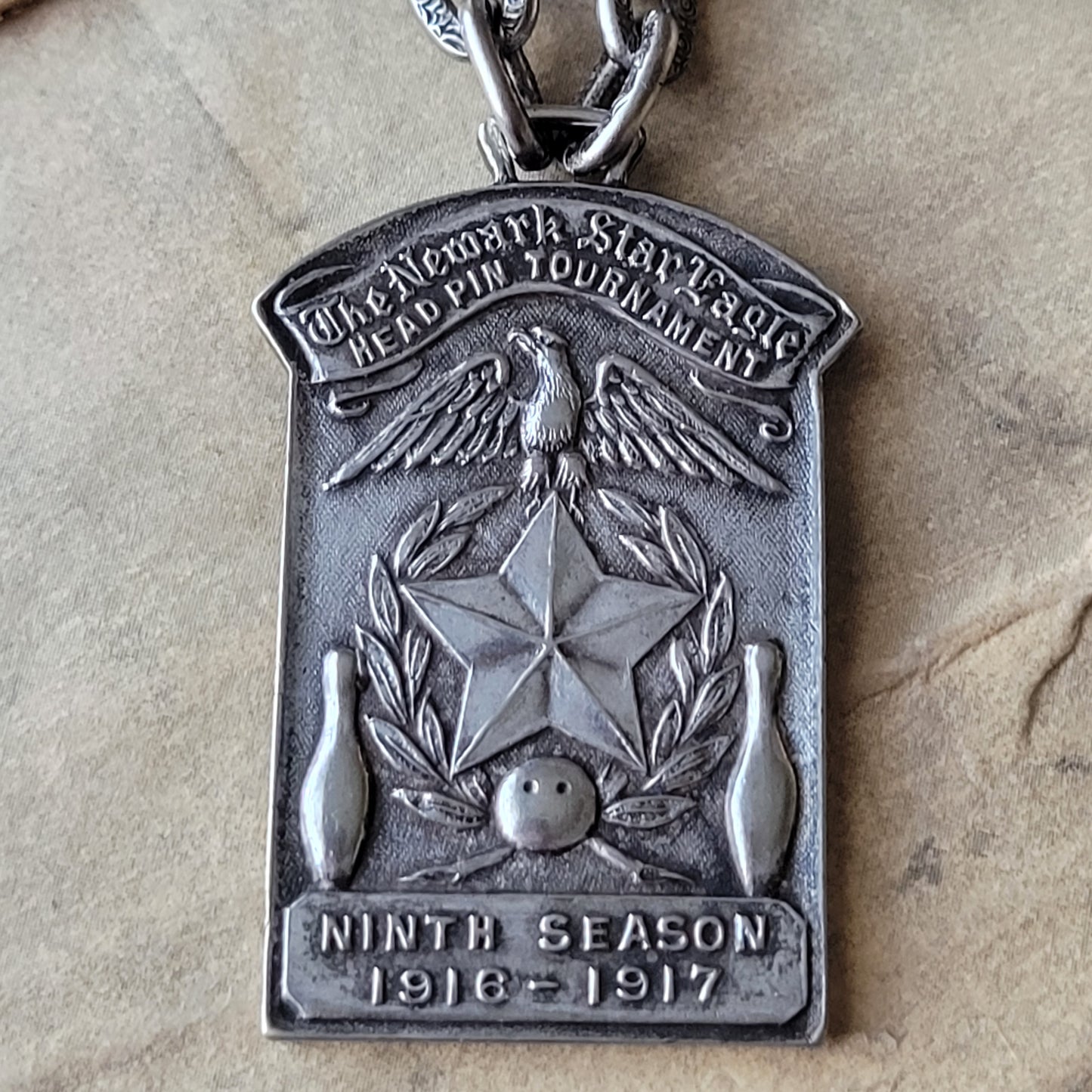 STAR EAGLE LANES,  1917 Vintage bowling medal necklace